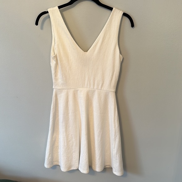 White dress with buttons. Mid length.Fitted on top. Very soft material! - Picture 2 of 5